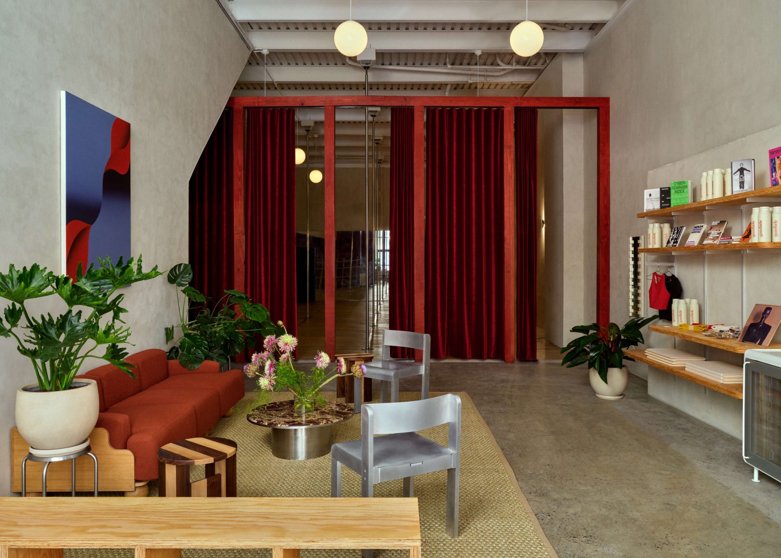 Softness and hard edges coexist in the lounge, which supports socializing in between classes.